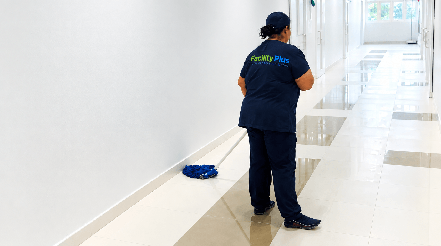 Educational facility corridor cleaning by Facility Plus